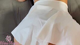 Yoga teacher stretches curvy teen student.