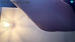 Milf plays with shaved pussy intensely