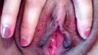 A brunette with big natural tits shows off her tight body and feet in a casual display