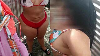 Latina babe poses provocatively for hidden camera on the beach