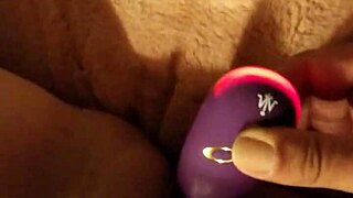 Girl plays with toys on her pussy.