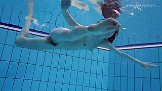 Skinny teen Anna Netrebko in bikini underwater.