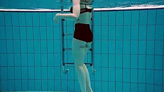 Dashka swims beautifully in the pool