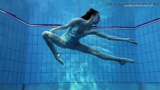 Skinny teen Anna Netrebko in bikini underwater.