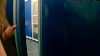 A young woman flashes in a hostel mixed room shower.