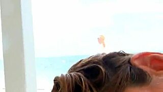 Candid beach footage of horny busty blonde masturbating