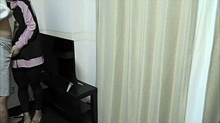 Conversational-Neutral Young Japanese couple gets intimate in living room before kids return