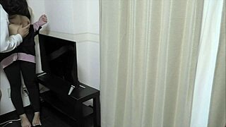 Conversational-Neutral Young Japanese couple gets intimate in living room before kids return