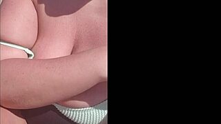 mature woman says, 'look at my pinky pussy and big tits topless on this public beach, so sexy.'