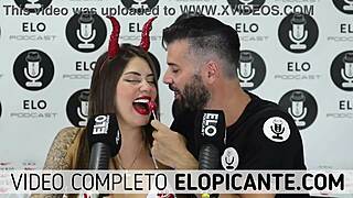 Blonde Sara sucks lollipop in spicy room, teasing her bum.