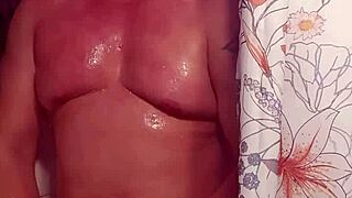 I'm playing with my big cock in the shower, feeling so good