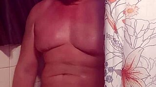 I'm playing with my big cock in the shower, feeling so good