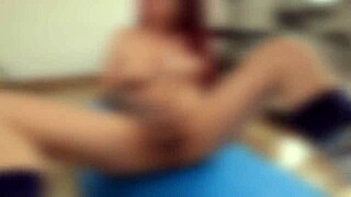 redhead milf gets aroused while working out at gym