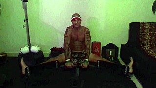 porn star stretches in split machine at gym
