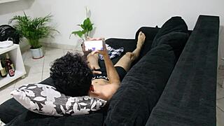 twink gives handjob to muscular bodybuilder while watching porn