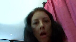 Brunette in lingerie enjoys licking and sucking