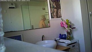 Granny showing off her massive boobs in a steamy close-up display.