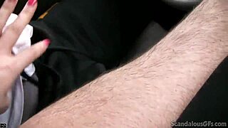 hot babe caught rubbing cock while guy drives on tape