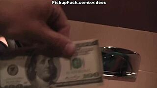 Two girls perform blowjob for 100 dollars in toilet.