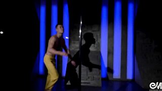 hot young gay guy does acrobatic strip tease on pole
