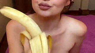 Look, hot brunette sucking a banana real good!
