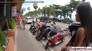 A petite Thai woman straddles a well-endowed man's massive shaft in cowgirl position