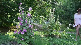 Charming Suzanna A UNDRESSING OUTDOOR in softcore striptease