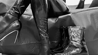 Fetish Model in Boots High Heels Latex Gloves Shiny Leggings Ass Worship