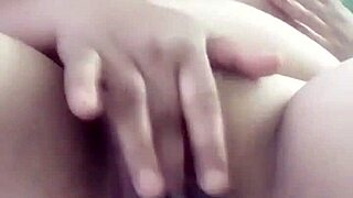 Pornstar Poosoo Teases Her Wet Pussy with Slow Fingering