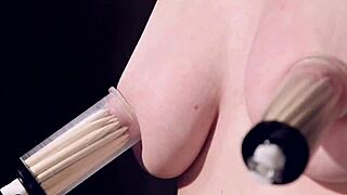 blonde slave in device bondage endures a harsh zipper punishment.