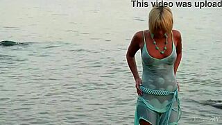 masha slowly takes it off, revealing her beautiful shaved body 😍