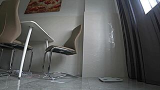 While her husband is at work, the wife cheats with a friend in the kitchen