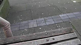 girl pisses in jeans while everyone stares in public