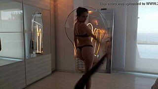 Antonia Sainz teases with a steamy strip dance. Watch her moves captivate!