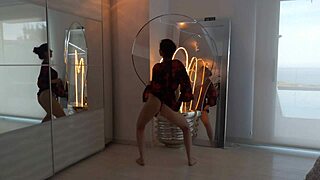 Antonia Sainz teases with a steamy strip dance. Watch her moves captivate!