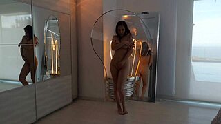 Antonia Sainz teases with a steamy strip dance. Watch her moves captivate!