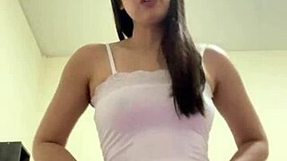 Asian reaches intense orgasm while masturbating.