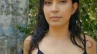 Skinny Latina brunette shows off wet tits in forest setting for presentation