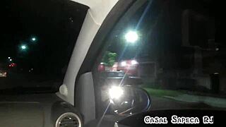 Sucking friend while driving in streets.