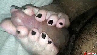 Couple Performs Footjob Leading to Cum on Webcam