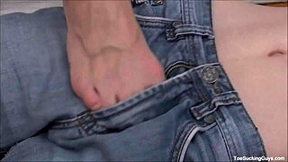 Gay stud gets his feet adored by a horny twink