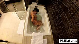 sexy jezebelle bond films her big tits and ass in the bath, teasing with her pussy