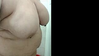 Alone at home, I bathe and then play with my vibrator.