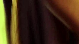 An asian brunette dances erotically, stripping and seducing with teasing moves, ripping clothes to reveal nude body in softcore scene.