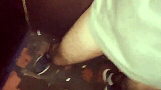 Dark room with three guys