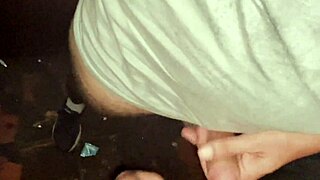 Dark room with three guys