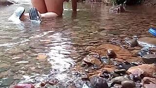 Alexachris20 fucks a stranger in the hot river outdoors.