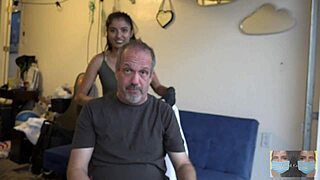 couple dying his hair brown in a fetish style