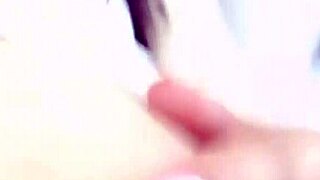 A young woman showcases her smooth, peachy shaved intimate area