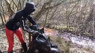 Mud trichtern leads to bizarre german femdom in latex outdoors